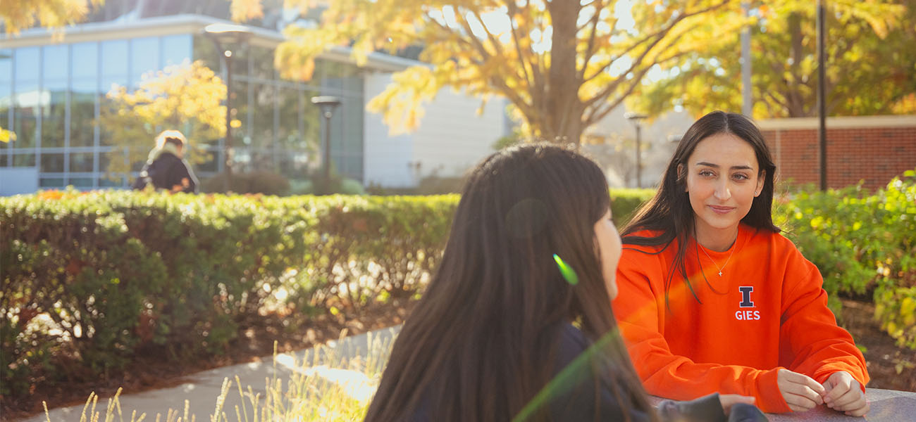Gies students talking outside