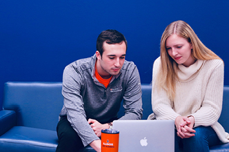 Two students working Two students working